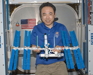 Astronaut Builds an International Space Station While on the International Space Station
